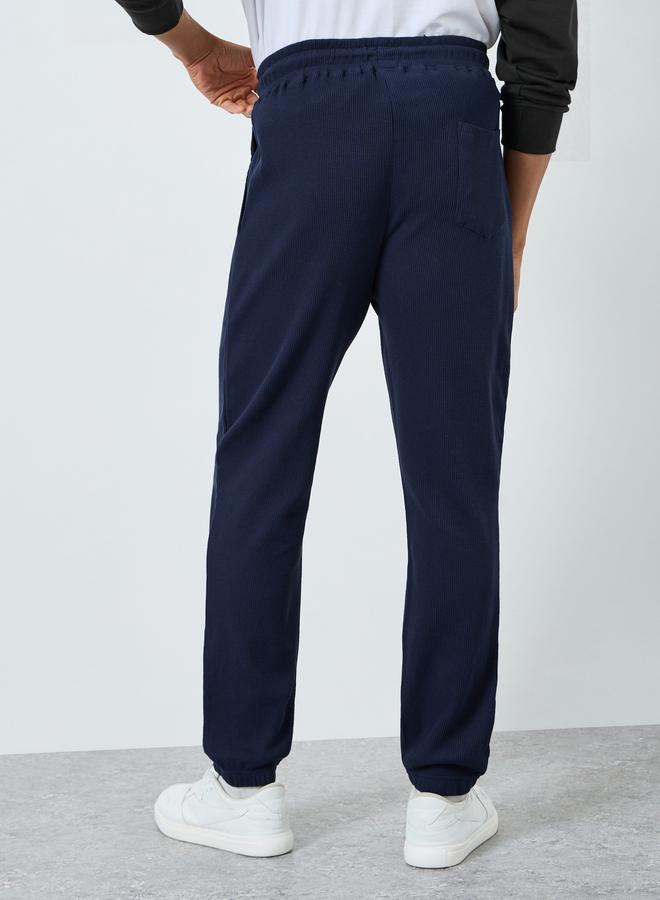 Styli Men Navy Blue Textured Waffle Knit Joggers - Image 3